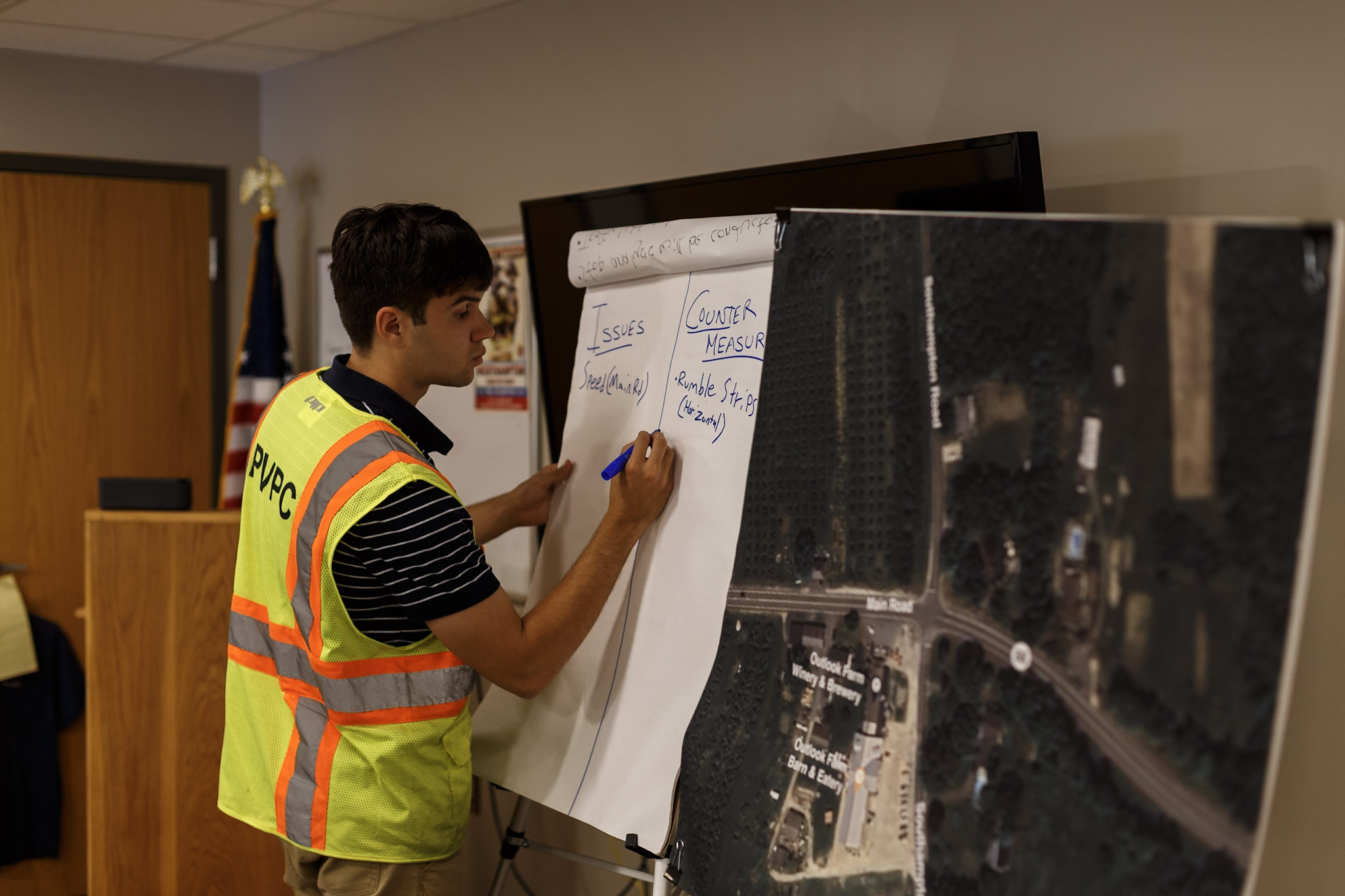Cole Hartford documenting roadway safety issues during a planning workshop